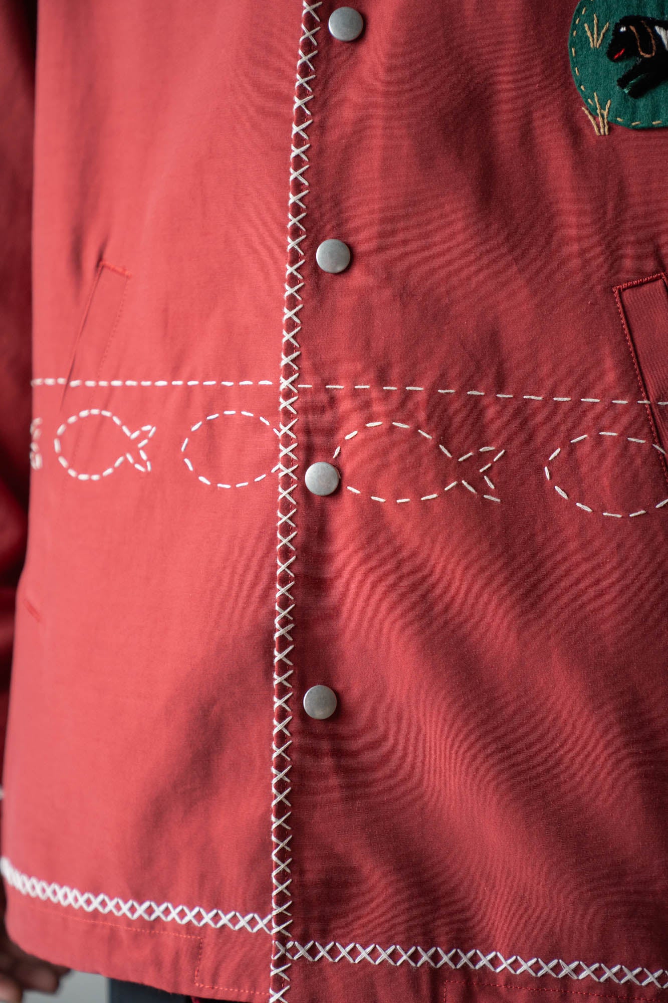 Cross-stitch coach jacket