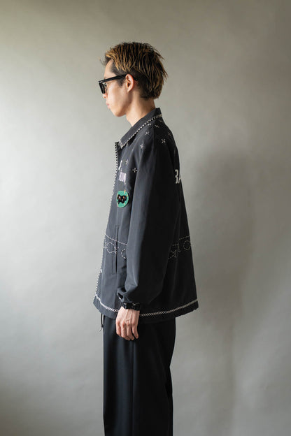 Cross-stitch coach jacket