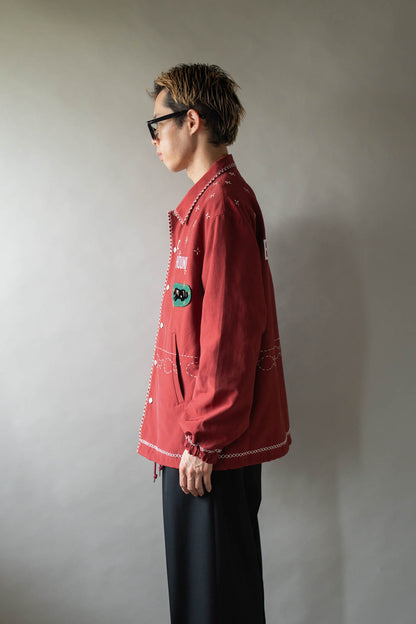 Cross-stitch coach jacket