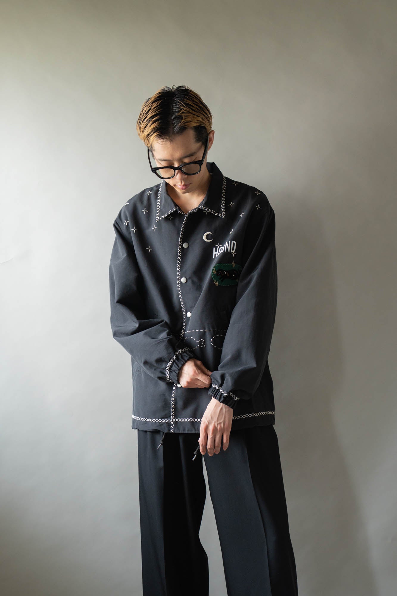 Cross-stitch coach jacket