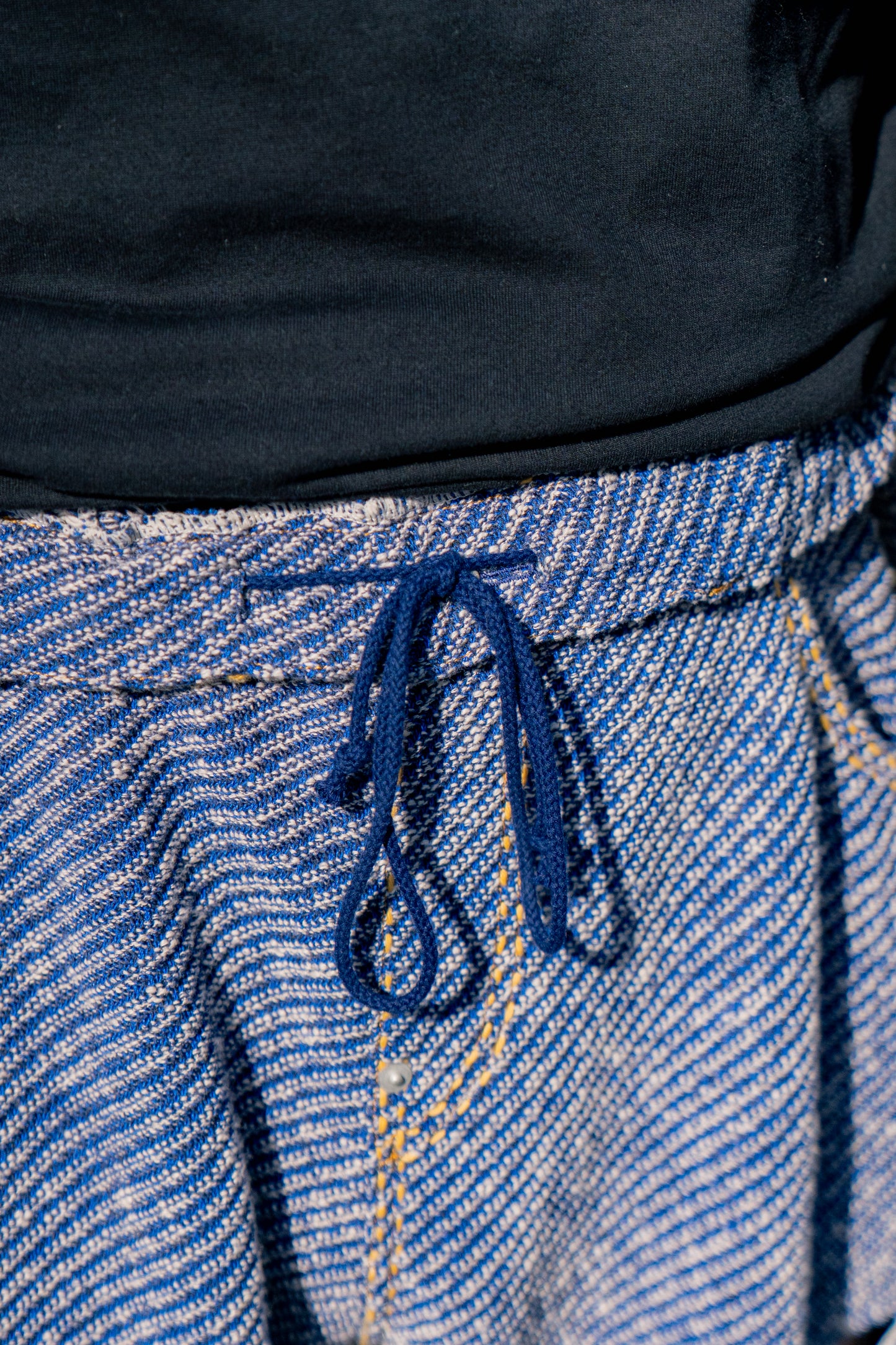 Hand-Stitched Damaged Denim Knit Pants 