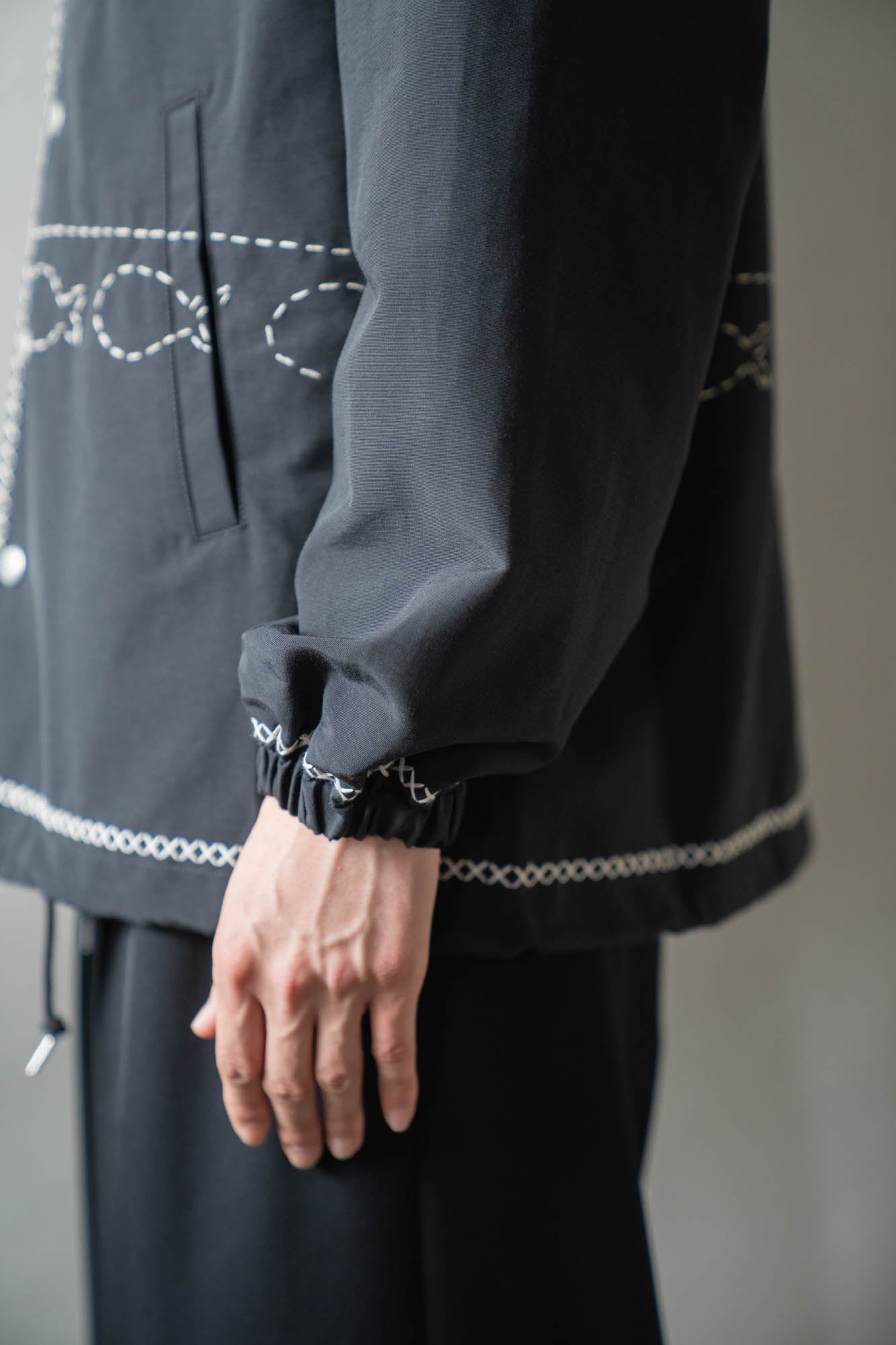 Cross-stitch coach jacket