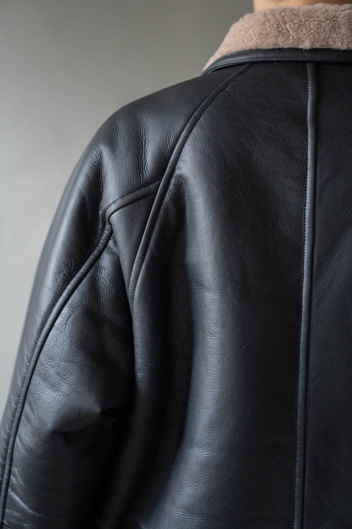 REVERSIBLE MOUTON BLOUSON