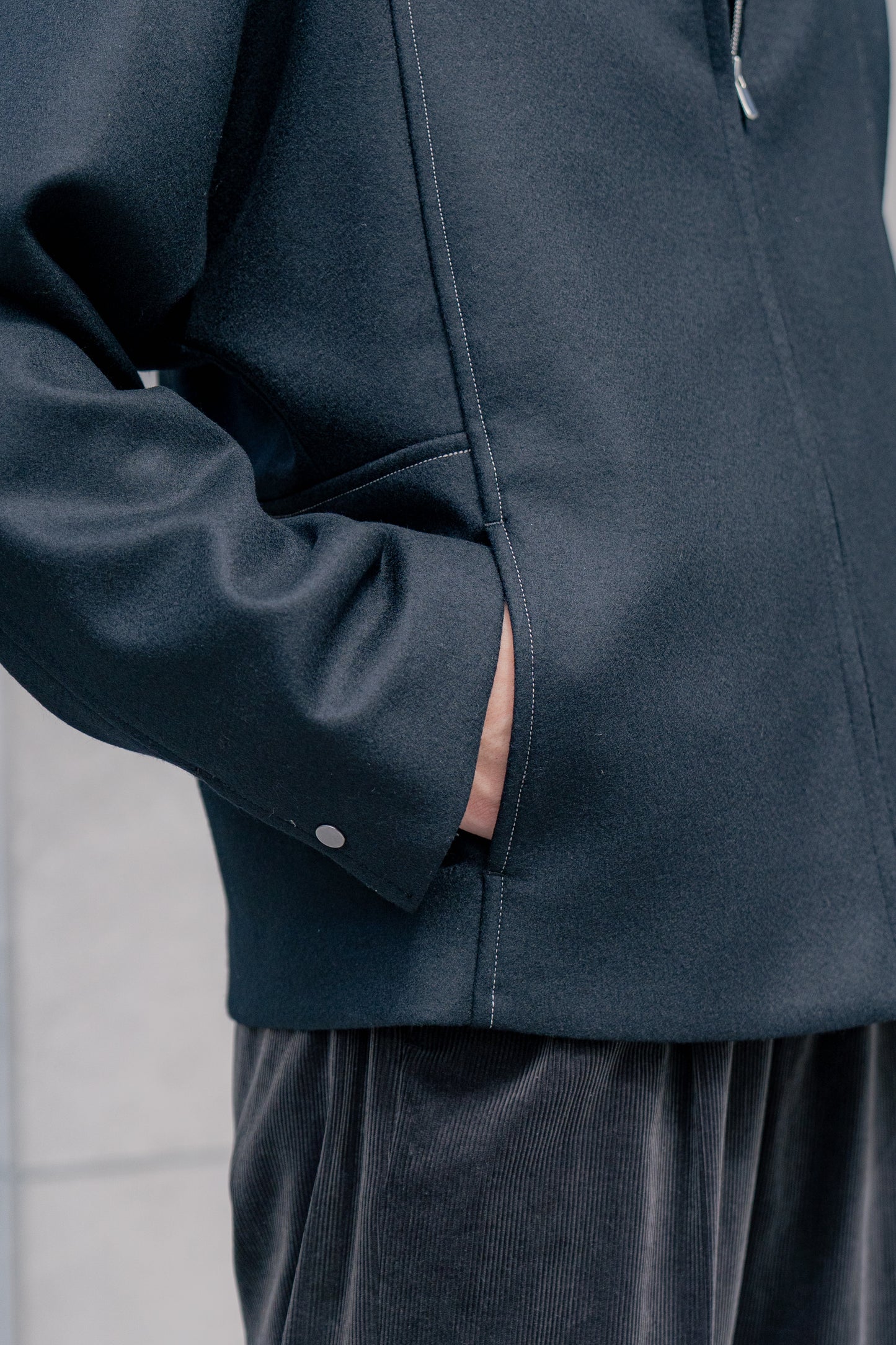 MODIFIED SLEEVE ZIP BLOUSON