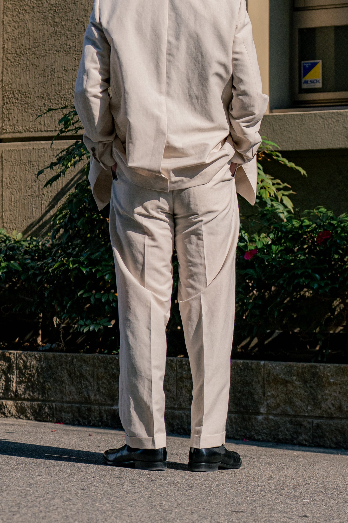 TWO TUCKS TAPERED TROUSERS